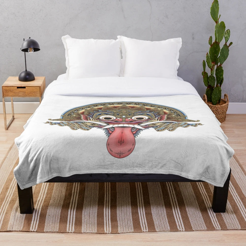 Soft, cozy plush blanket featuring the traditional Bali Boma design