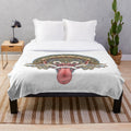 Soft, cozy plush blanket featuring the traditional Bali Boma design
