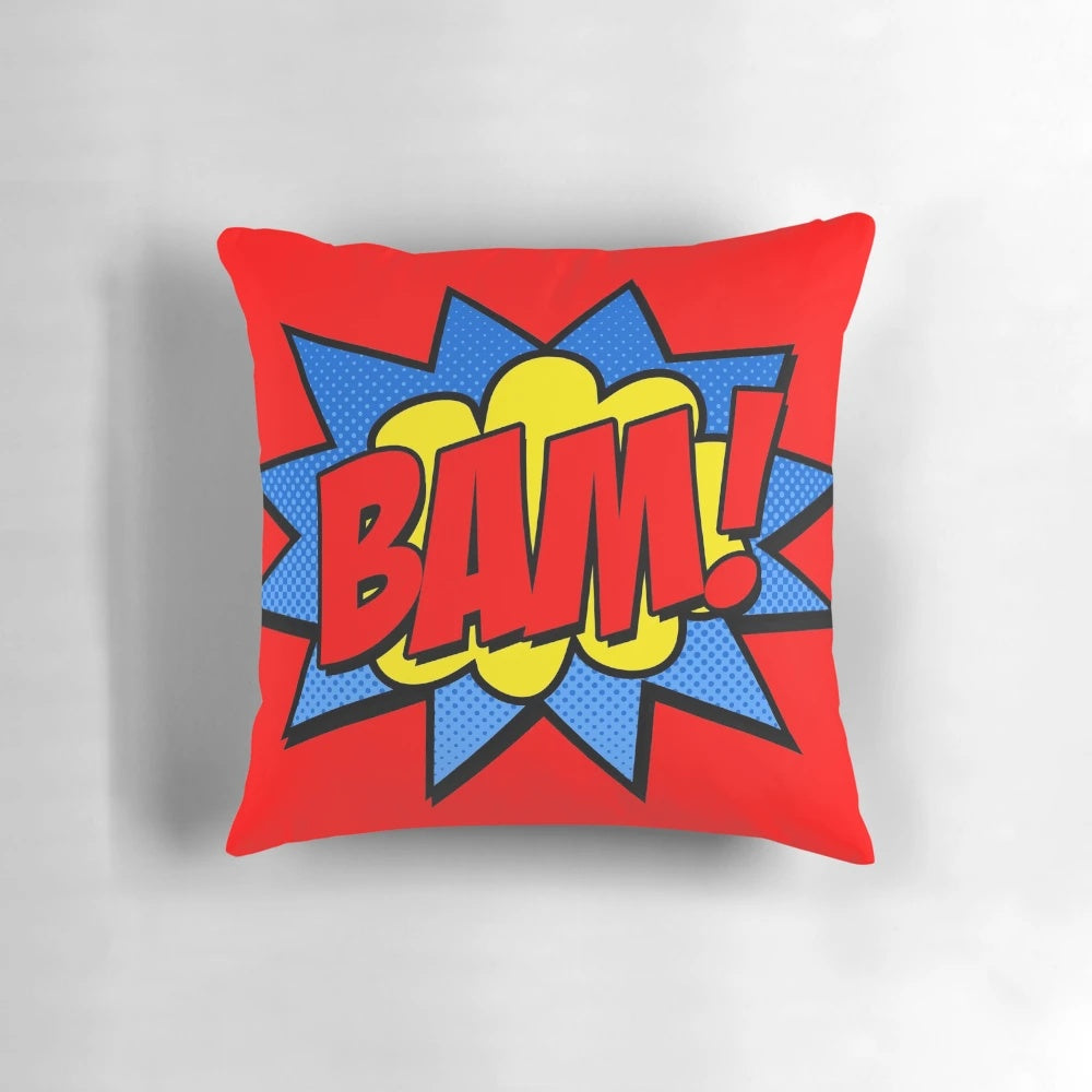A vibrant and bold "Bam!" text pillow with a pop art, comic book inspired design.