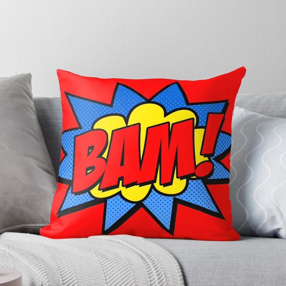 A vibrant and bold "Bam!" text pillow with a pop art, comic book inspired design.
