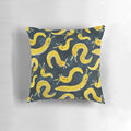 Vibrant yellow banana slug print on a cozy throw pillow for a playful, Pacific Northwest-inspired home accent.