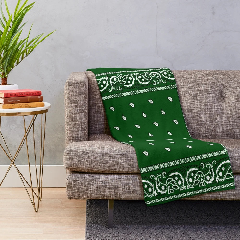 Green plush blanket with bandana-style pattern, perfect for hip hop and urban aesthetics