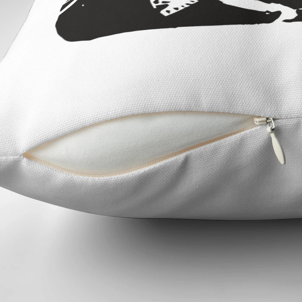Pillow featuring a Banksy graffiti artwork of a girl with a blue bird
