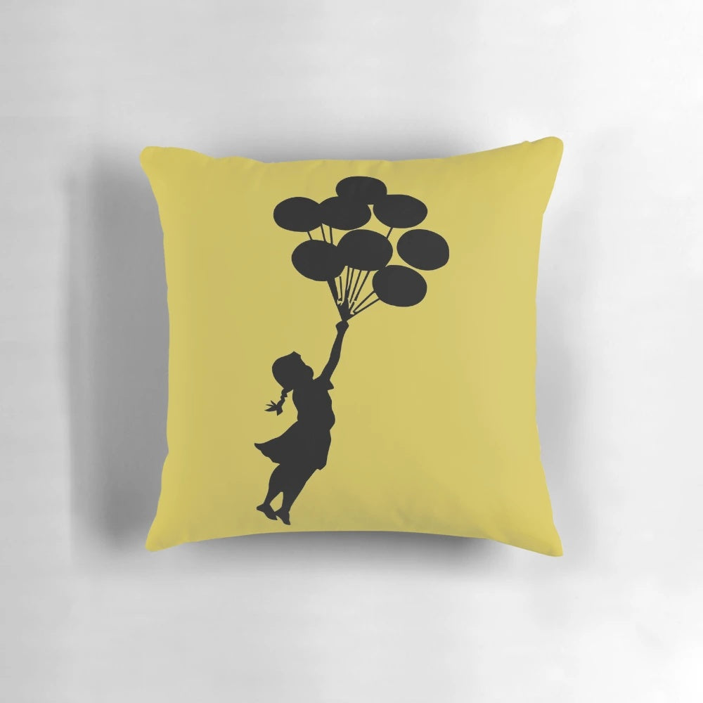 Banksy inspired balloon girl graffiti print on a decorative throw pillow
