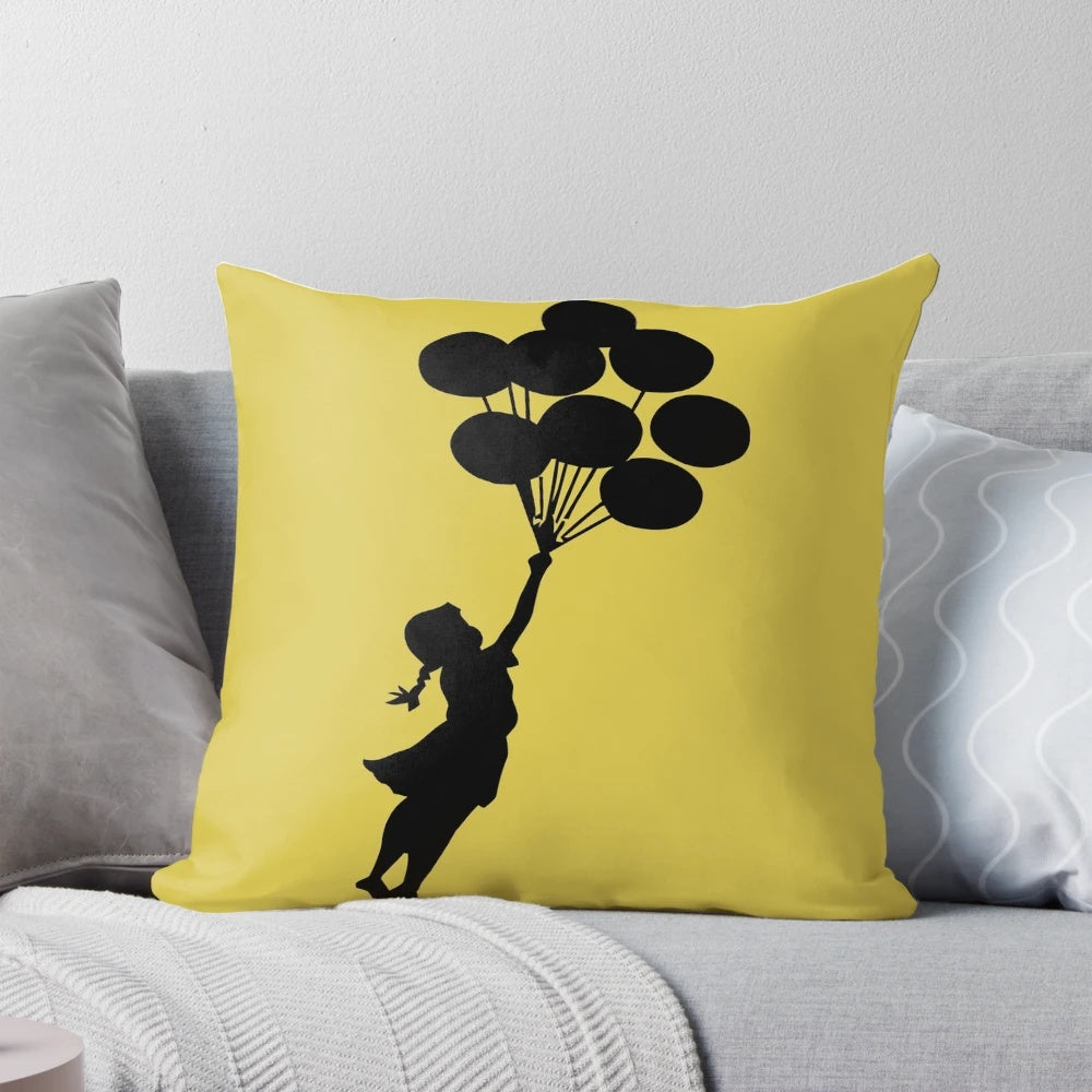 Banksy inspired balloon girl graffiti print on a decorative throw pillow