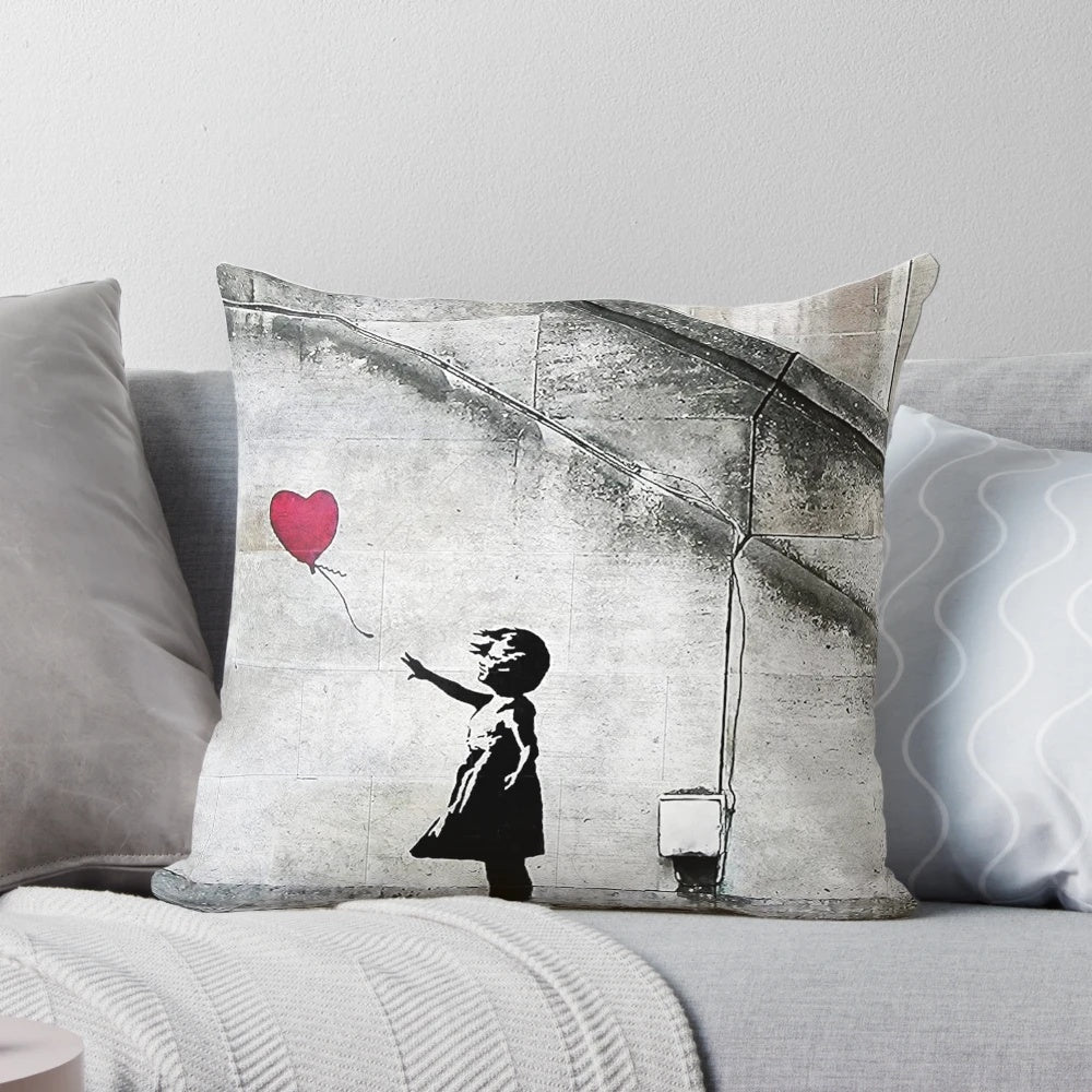 Vibrant and striking Banksy-inspired pillow featuring the iconic "Balloon Girl" mural, symbolizing hope and social commentary.