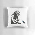 Pillow featuring a Banksy-style stencil graffiti of a girl with a blue bird, captured in Hull city centre, England.