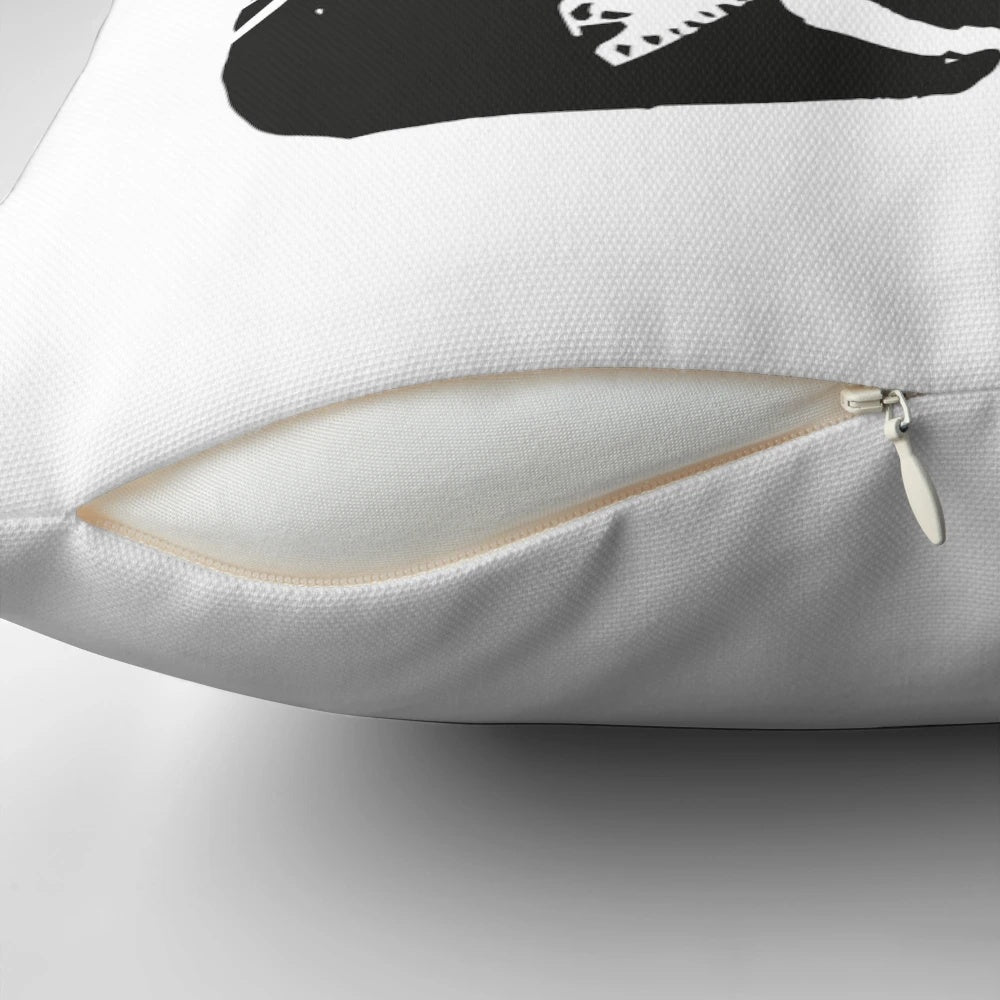 Pillow featuring a Banksy-style stencil graffiti of a girl with a blue bird, captured in Hull city centre, England.