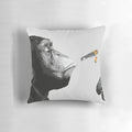 Graffiti-style pillow featuring a monkey smoking a joint, inspired by Banksy's street art
