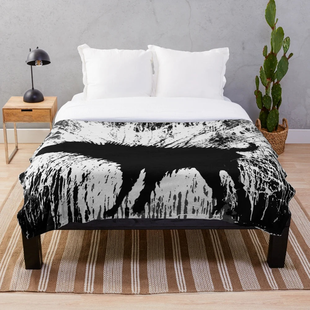 Banksy-inspired plush blanket with dog silhouette shaking off water