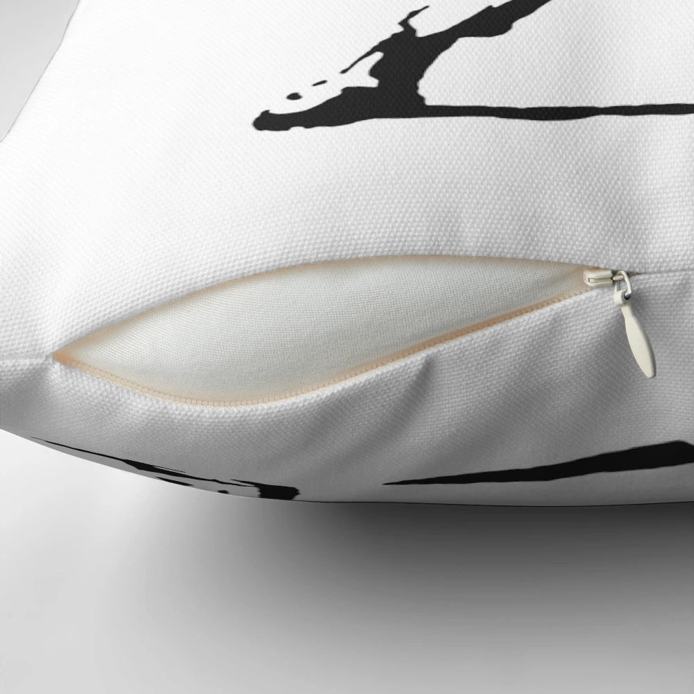 Pillow featuring Banksy's iconic "Flower Thrower" graffiti design, a symbol of nonviolent resistance.
