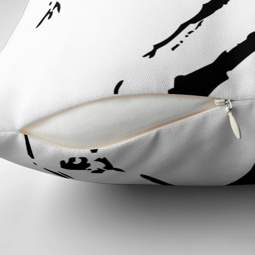 Vibrant pillow featuring the iconic Banksy "Flower Thrower" street art design