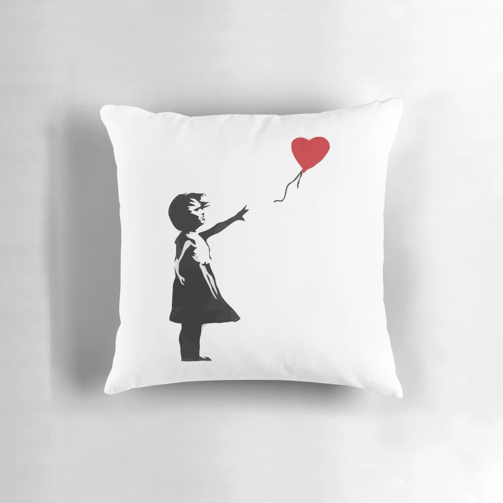 Banksy-inspired throw pillow featuring the iconic "Girl with Balloon" stencil artwork
