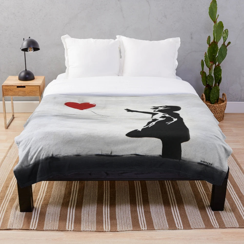 Banksy-inspired plush blanket featuring the iconic "Girl with Heart Balloon" graffiti art