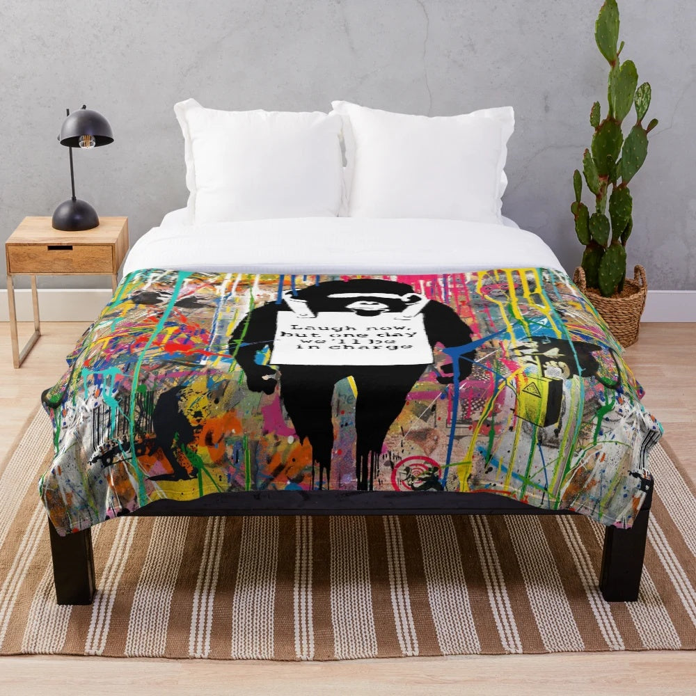 Banksy-inspired graffiti art plush blanket featuring a colorful collage of animals and urban art elements