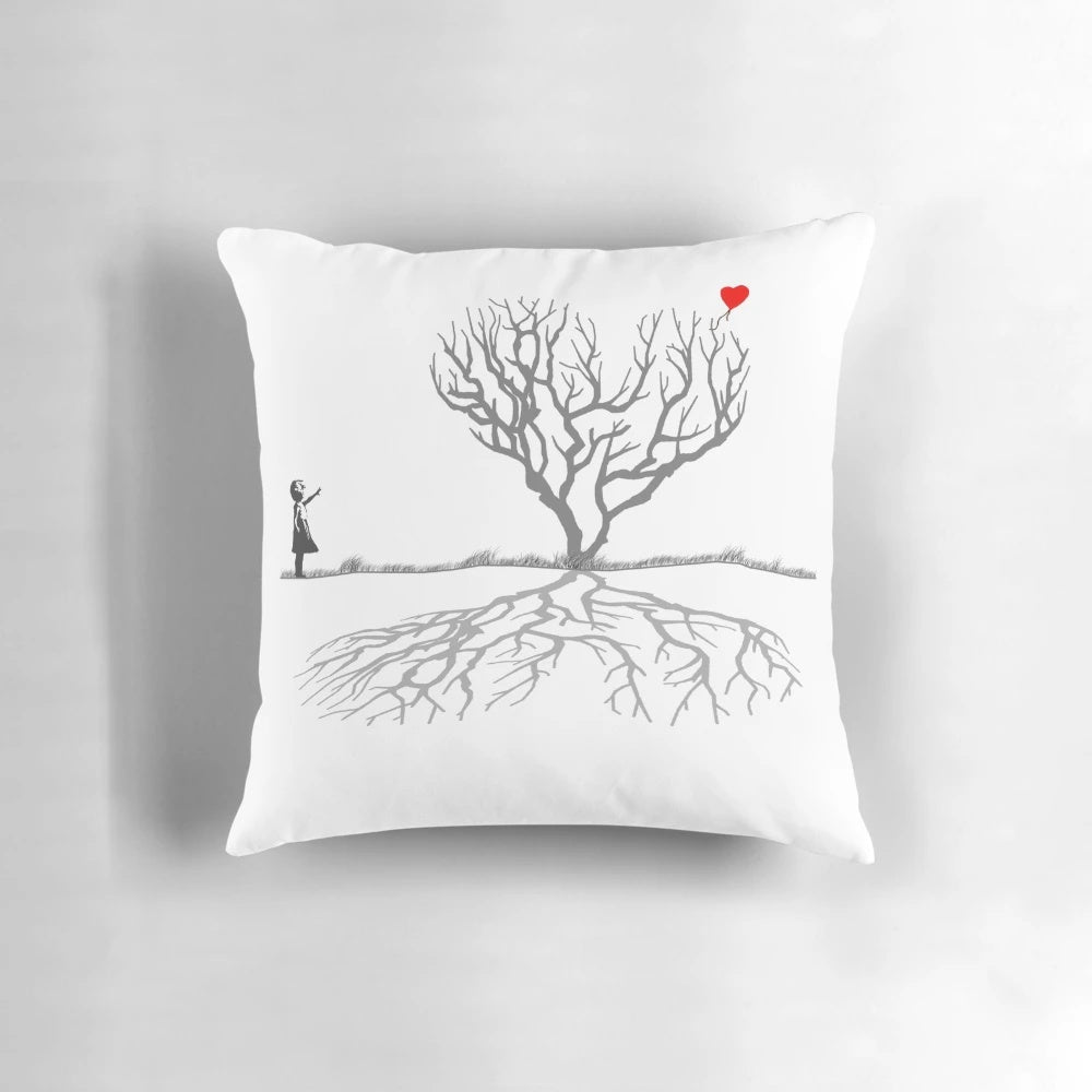 Banksy-inspired throw pillow featuring a heart-shaped tree design, perfect for adding a touch of contemporary street art to any home decor.