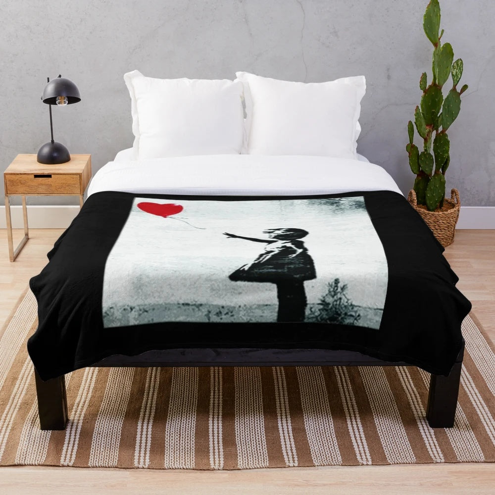 Banksy-inspired plush blanket featuring the iconic "Hope" design