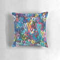 Banksy-inspired love hearts graffiti design printed on a high-quality pillow