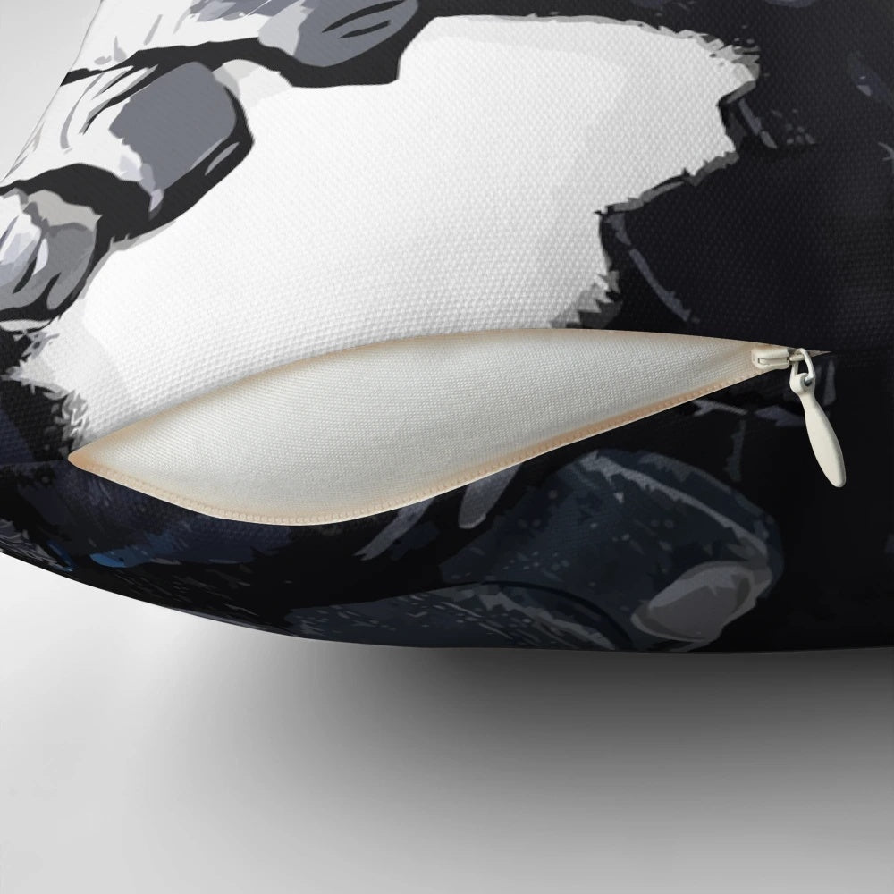 An image of a Banksy-inspired white pillow featuring a monkey wearing headphones and appearing to be deep in thought.