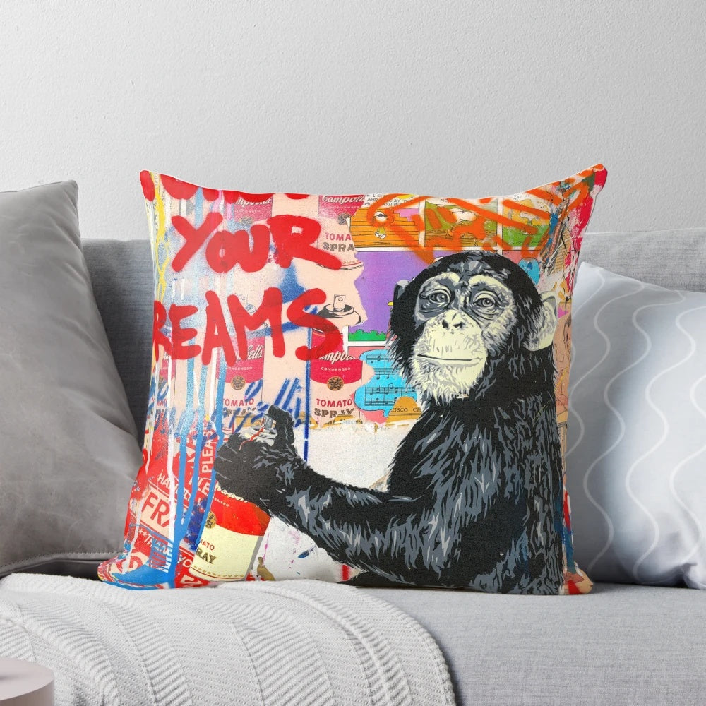 Banksy-inspired pillow featuring a stencil artwork of a monkey with the text "Follow Your Dreams"