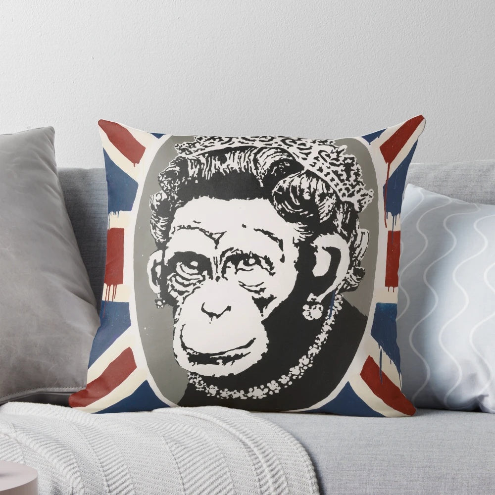 Banksy-inspired monkey stencil printed on a soft, decorative throw pillow for urban home design.