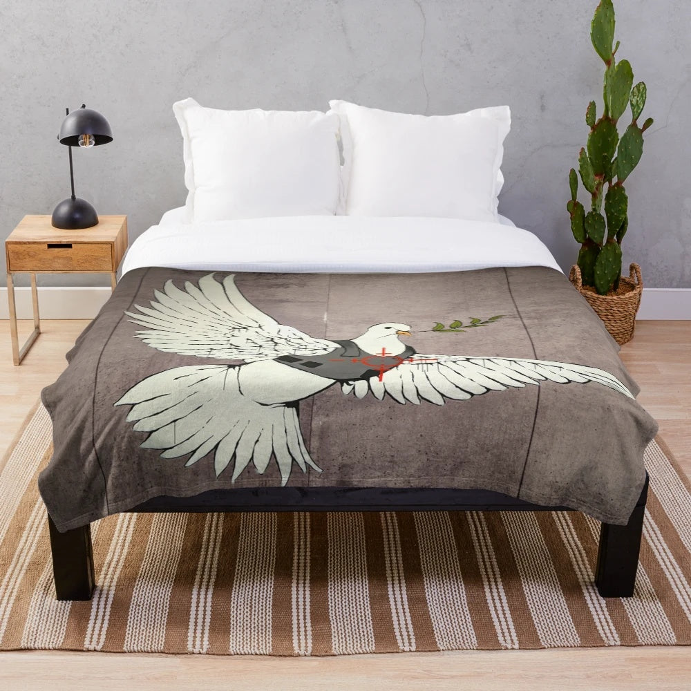 Banksy-inspired plush blanket featuring the Armored Dove of Peace street art design