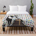 Banksy-inspired plush blanket featuring graffiti-style artwork