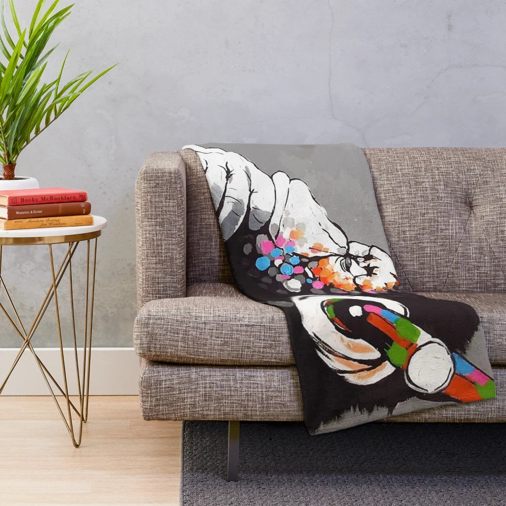 Plush blanket featuring a Banksy-style monkey DJ with headphones