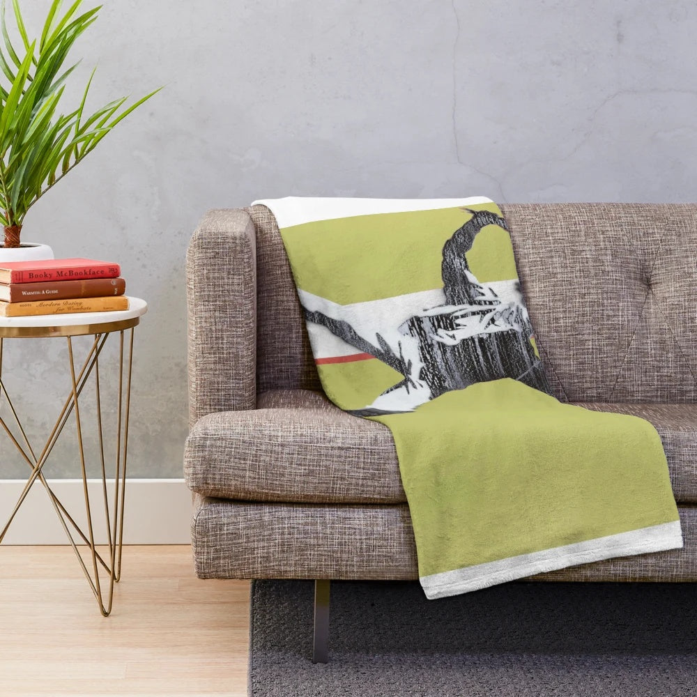Riot green plush blanket with Banksy-style flower thrower design