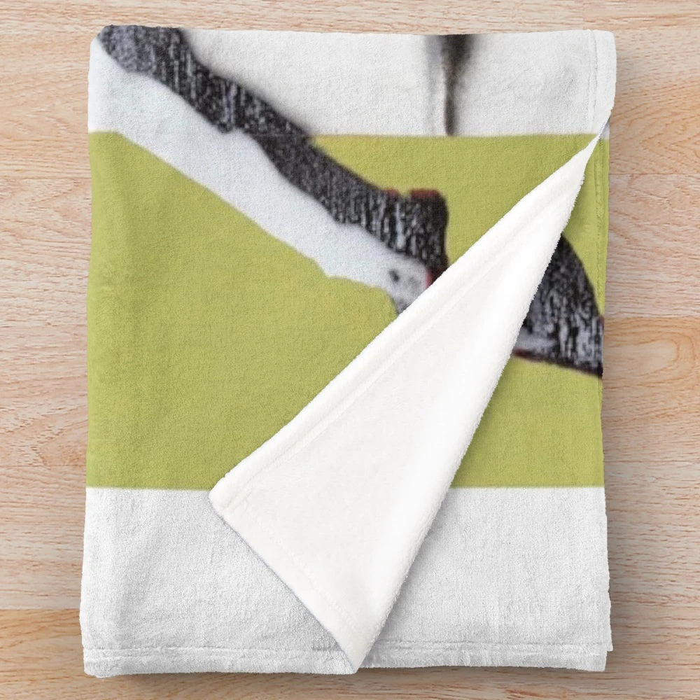 Riot green plush blanket with Banksy-style flower thrower design