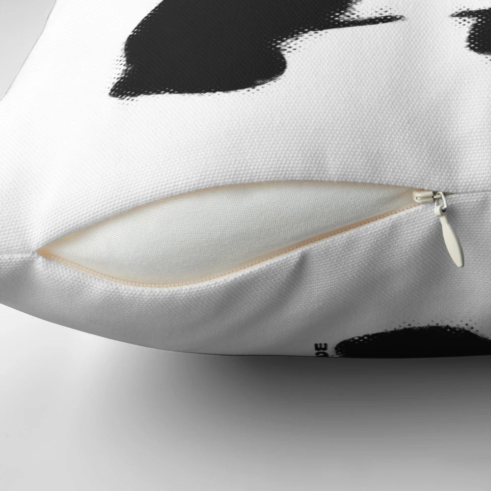Banksy-inspired panda with guns stencil graffiti art on a high-quality pillow