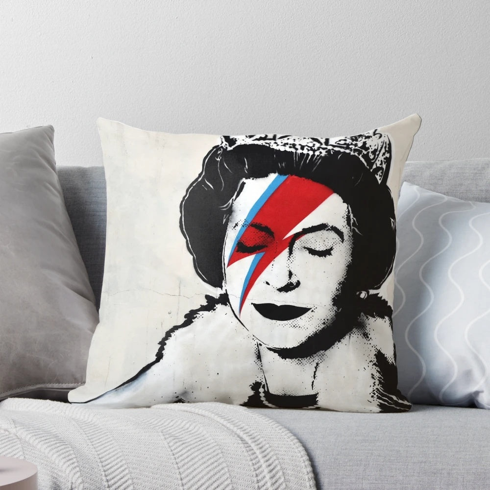 Colorful Banksy-style pop art portrait of Queen Elizabeth on a decorative throw pillow