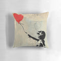 Banksy-inspired red heart-shaped balloon decorative pillow with urban graffiti design