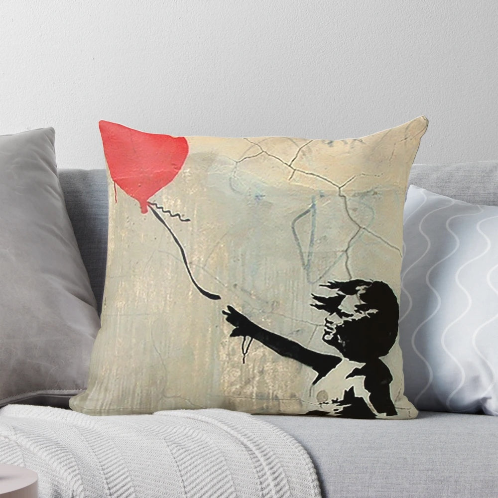 Banksy-inspired red heart-shaped balloon decorative pillow with urban graffiti design