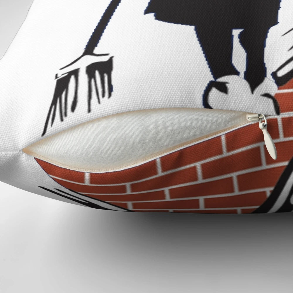 Banksy-inspired decorative pillow featuring the "Swept Under the Rug" artwork