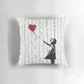 Colorful contemporary street art pillow featuring Banksy's iconic 'Girl With a Red Balloon' design