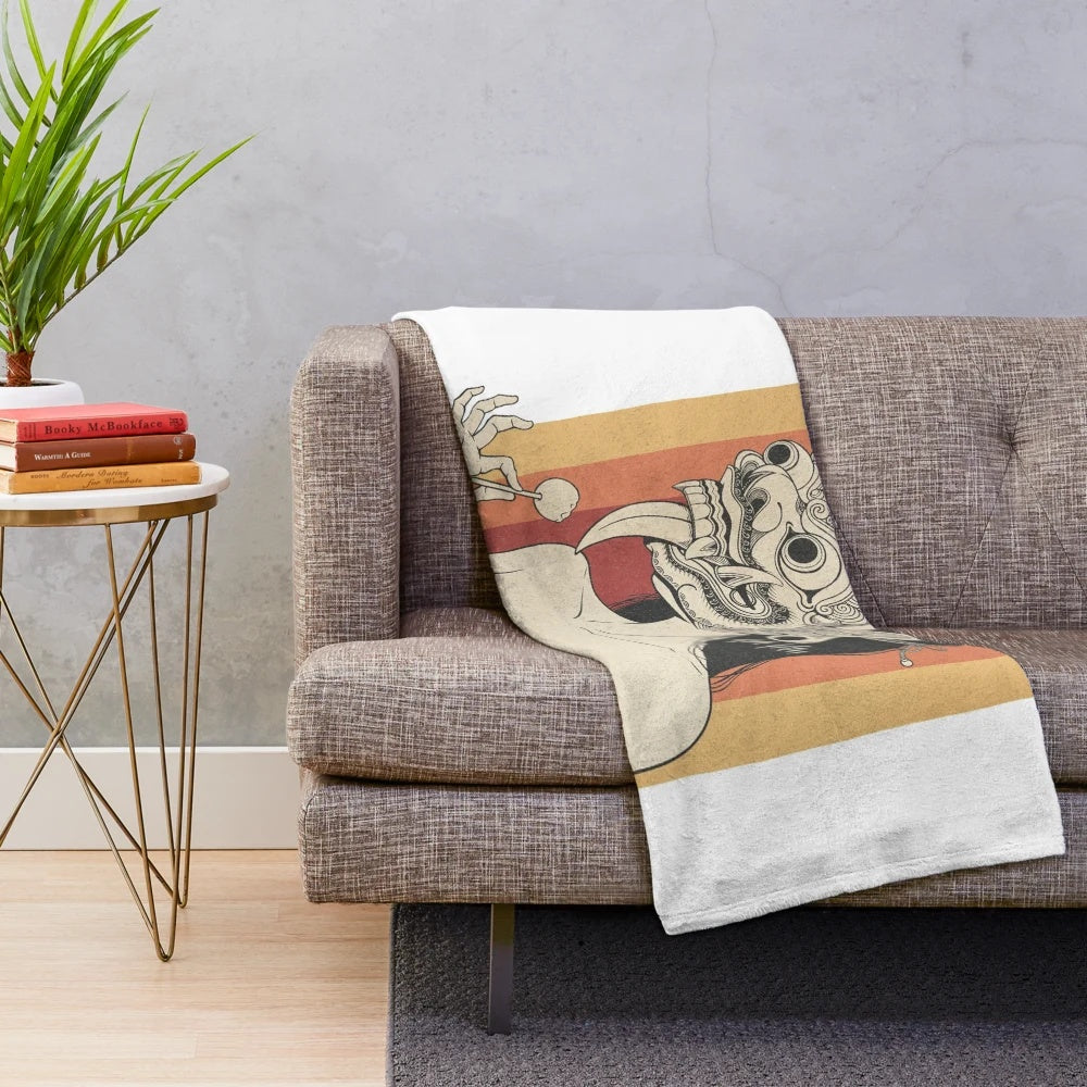 Barong-inspired plush blanket featuring traditional Balinese art