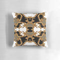A golden ornamental pillow with a baroque-style design and symmetrical pattern.