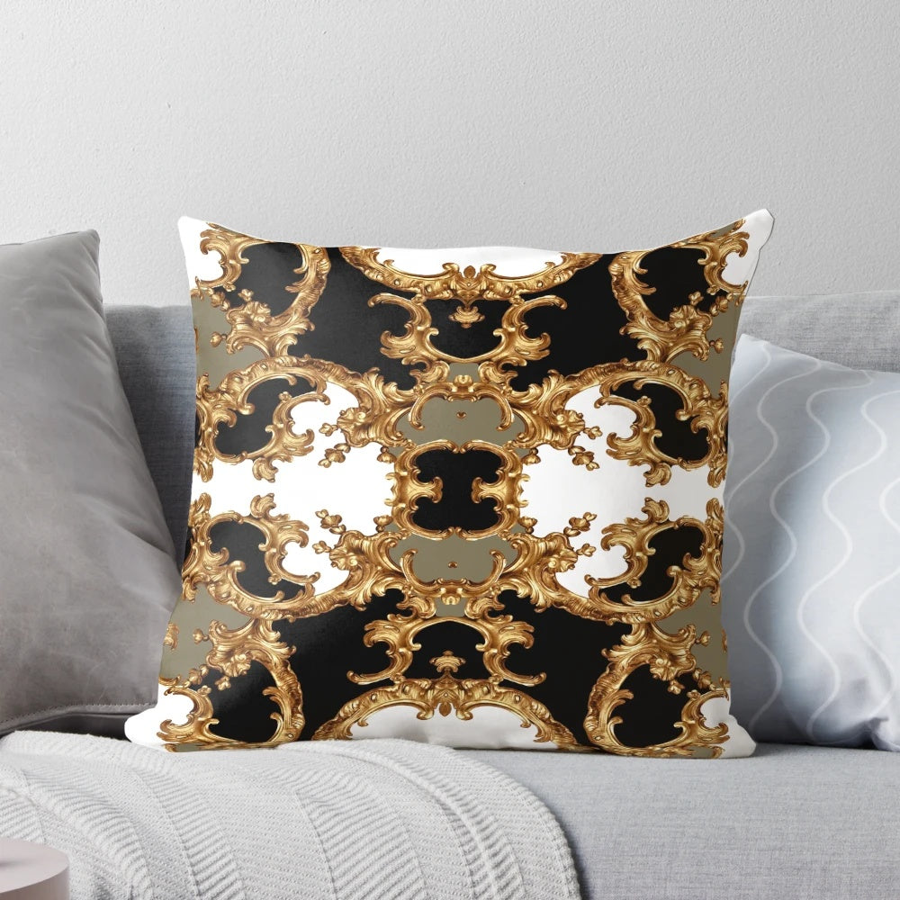 A golden ornamental pillow with a baroque-style design and symmetrical pattern.