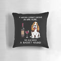 A decorative pillow featuring a basset hound dog and wine glass design, ideal for dog mom gifts and home decor.
