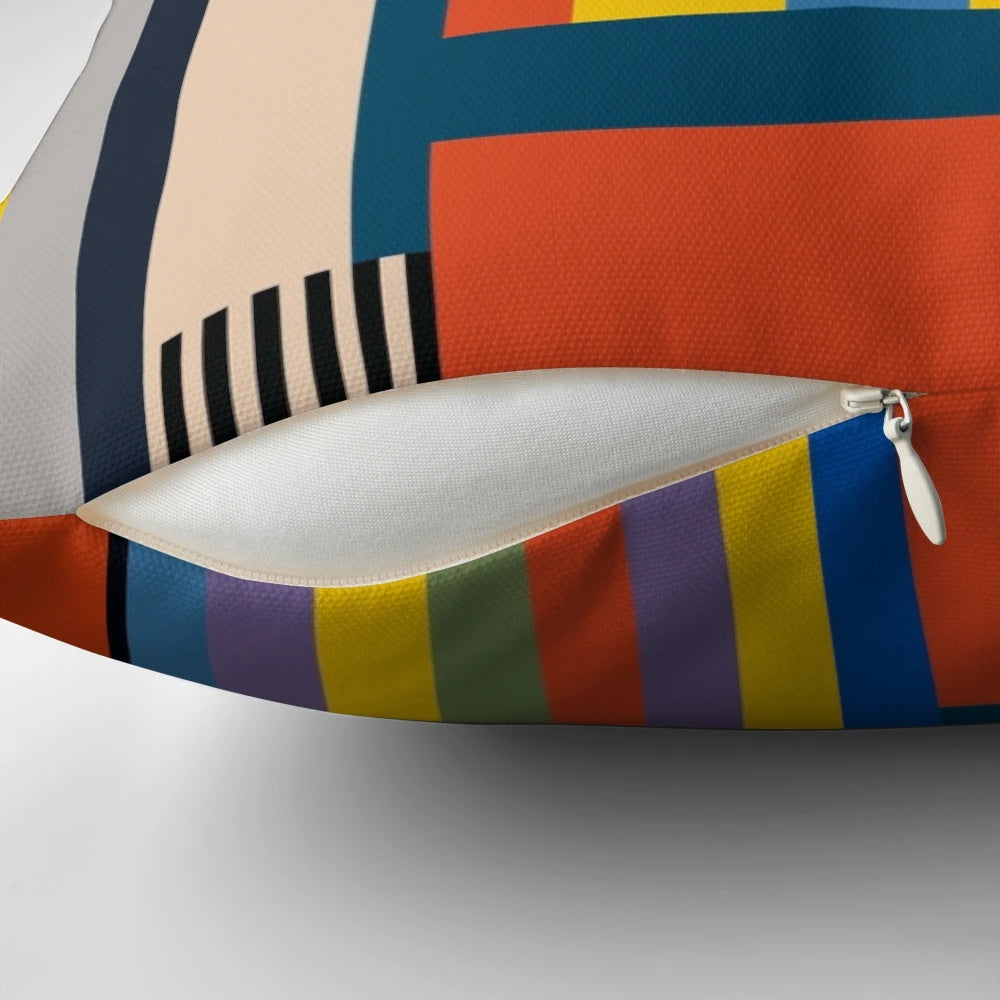 Vibrant Bauhaus-style pillow with abstract geometric shapes and bold colors