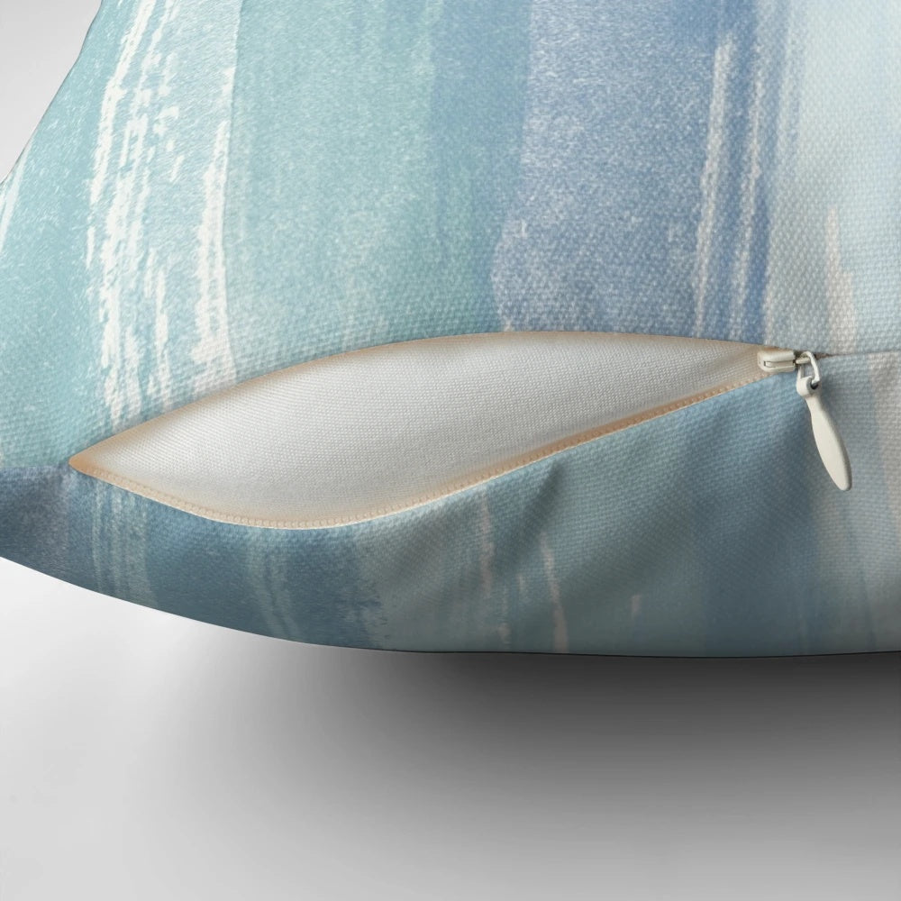 Beaching watercolor beach pillow with blue, turquoise, and white striped design