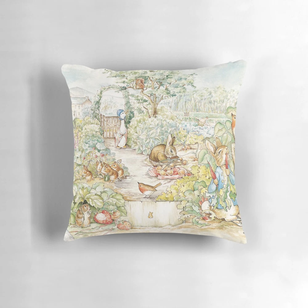 Beatrix Potter garden illustration pillow featuring Peter Rabbit and other woodland animals