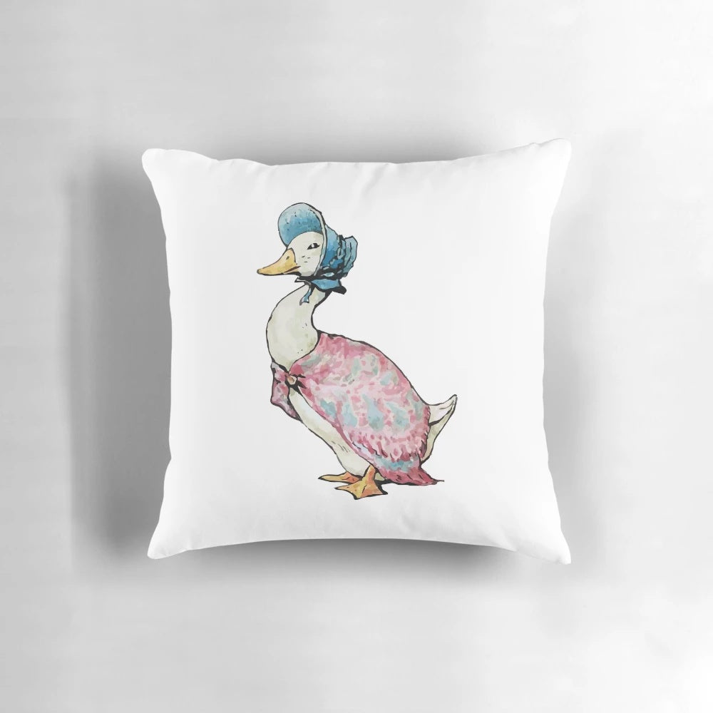 Beatrix Potter's Jemima Puddle-Duck and Peter Rabbit characters featured on a decorative pillow
