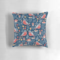 Vibrant pillow featuring a colorful birds and flowers floral ornament in a traditional folk art style.