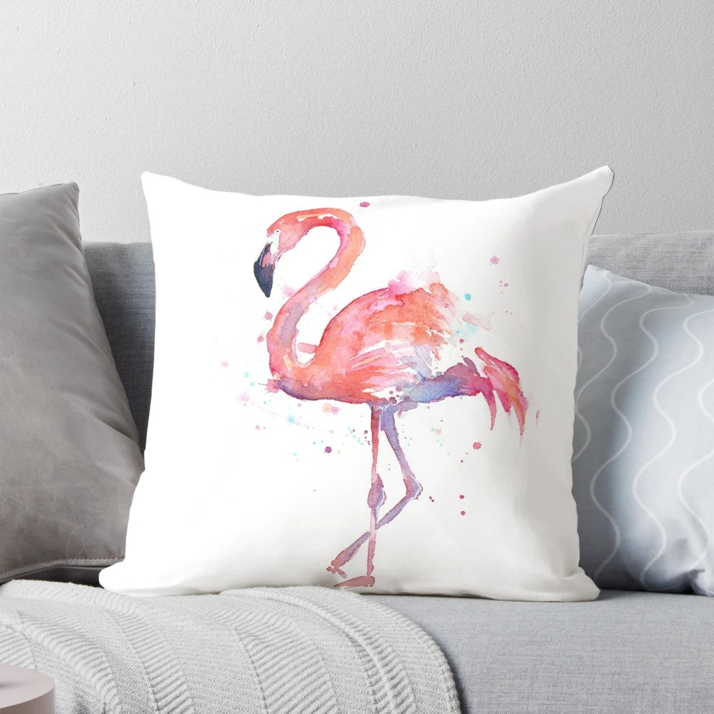 Vibrant pink flamingo watercolor illustration printed on a soft, high-quality pillow