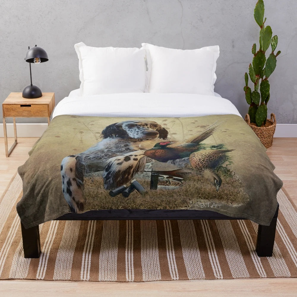 Plush blanket with artwork of an English setter hunting dog and pheasants