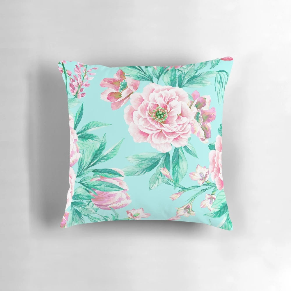 A beautifully hand-painted floral pillow featuring a bold, vibrant peony design.