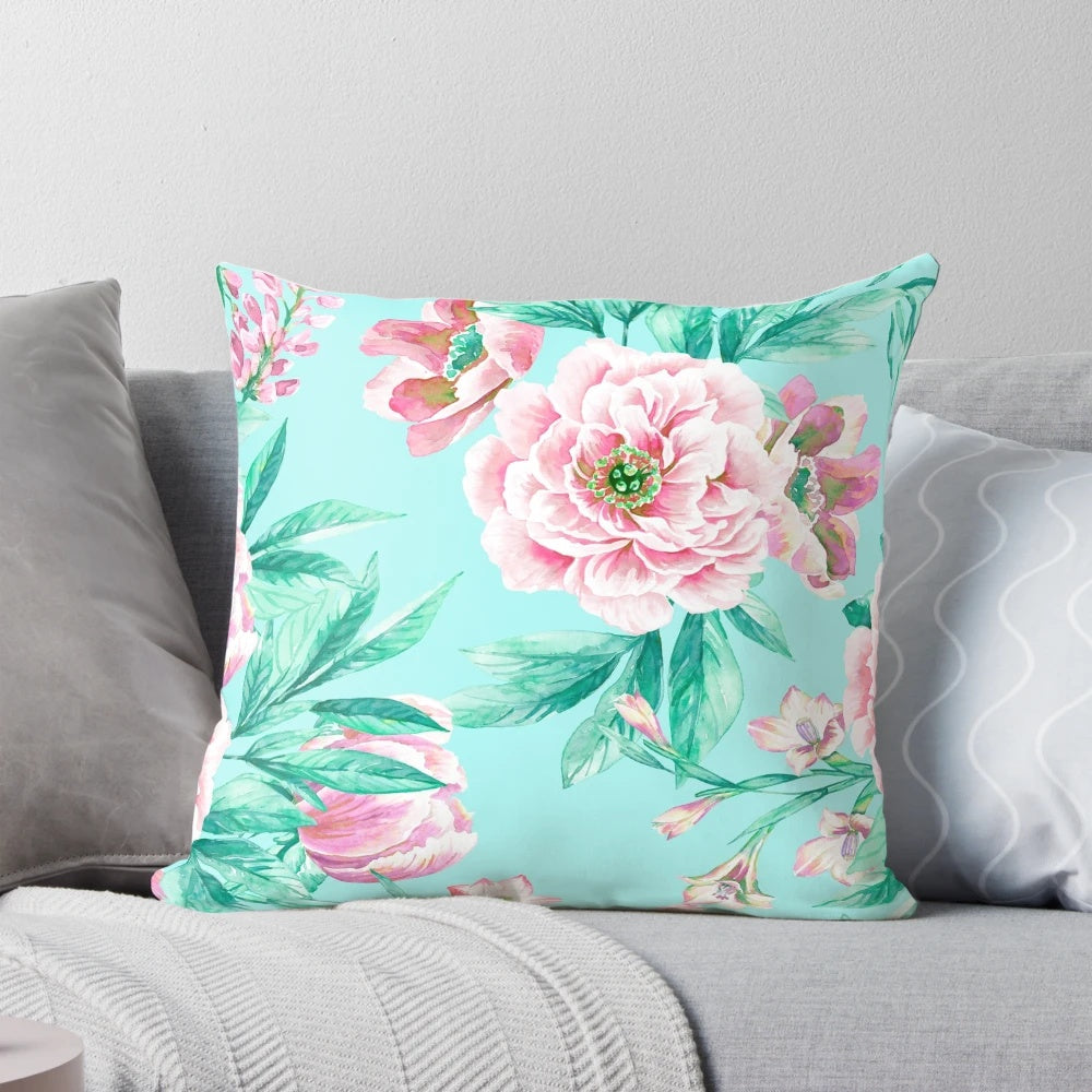 A beautifully hand-painted floral pillow featuring a bold, vibrant peony design.