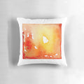 Vibrant abstract watercolor painting in red, orange, and gold tones on a decorative throw pillow design.